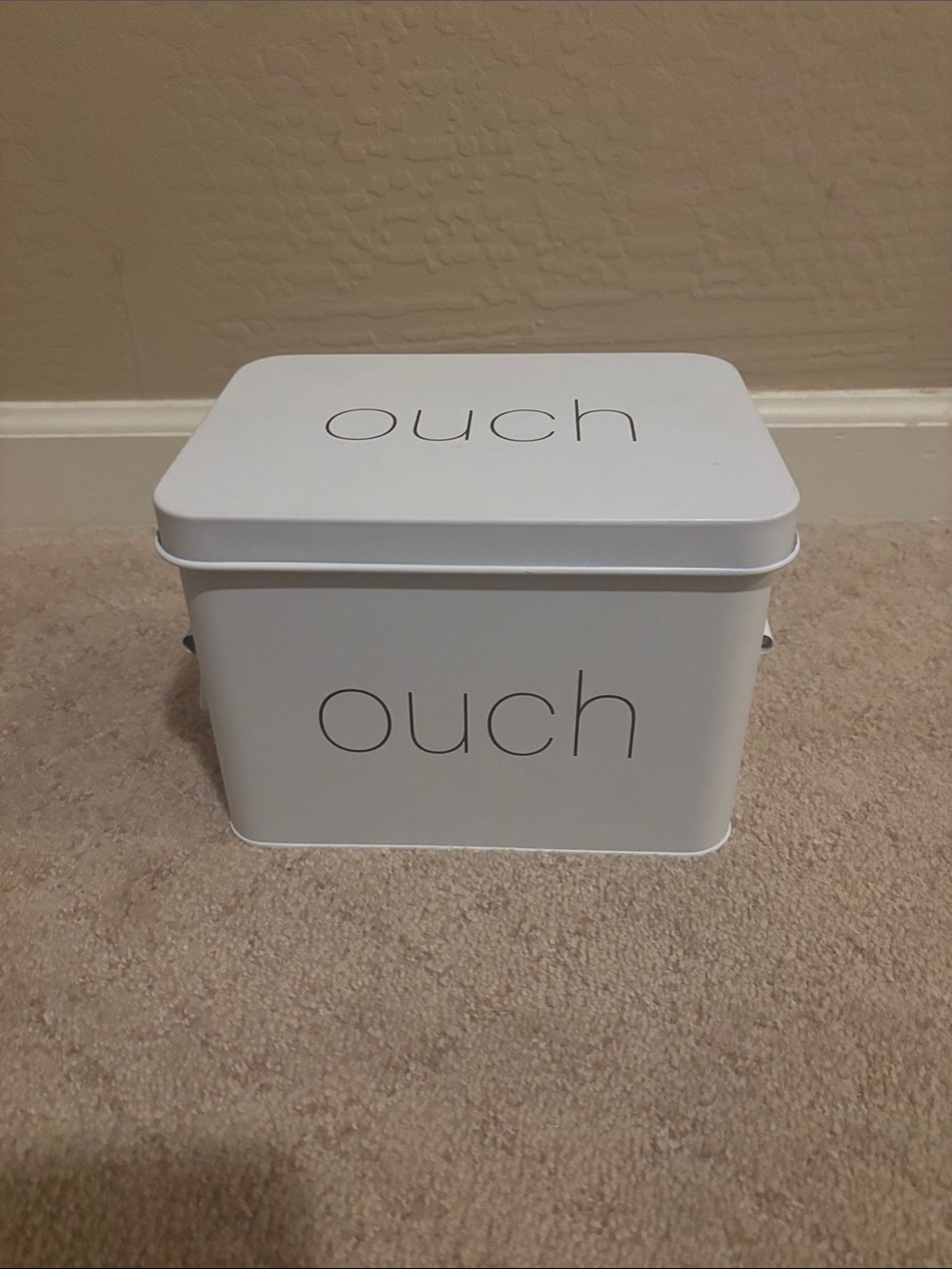 White 'ouch' Metal Storage Tin